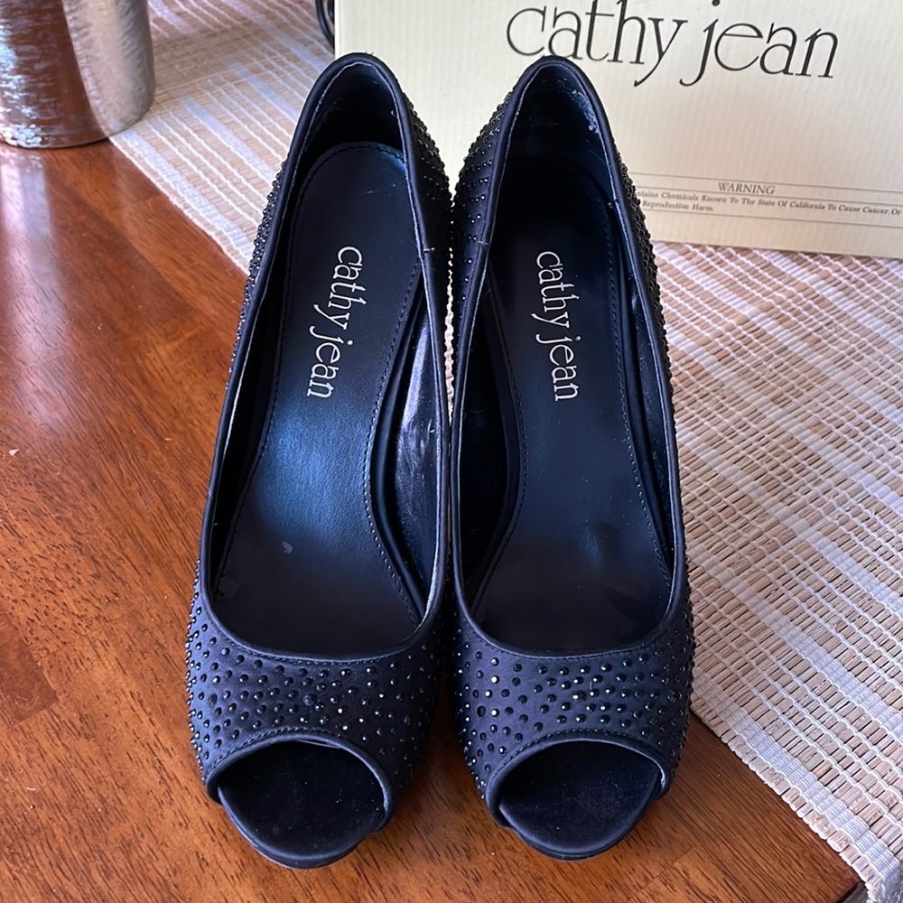 Black beaded open toe pumps